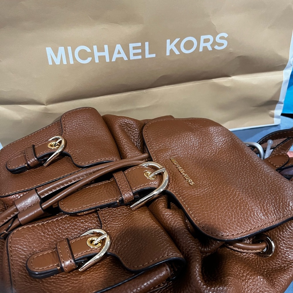 Michael Kors camel backpack. Susie style Great condition